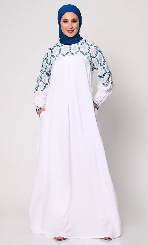 Embroidered Letters Elegant Simplicity: Embroidered White Abaya with Box Pleats and Dual Pockets Embroidered Letters Elegant Simplicity: Embroidered White Abaya with Box Pleats and Dual Pockets